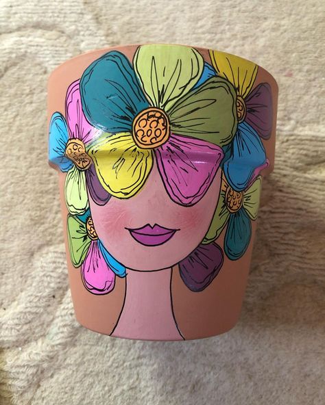 Craftymomma19 on Instagram: “New painted clay pot. Second in the series of flower girls I’ve done recently…. Have a few more pots to paint. #rocksofinstagram #diy…” Pot Painting Ideas For Competition, Easy Flower Pot Painting Ideas, Pot Designs Painted Indian, Plant Pot Painting Ideas, Frida Kahlo Painted Pots, Painted Lady Face Flower Pots, Painted Cats Terracotta Flower Pot, Top Paintings, Clay Pot People