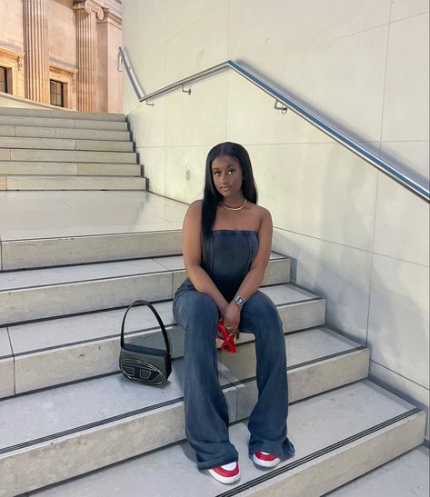 Black girl wearing black two piece set. Wearing red and white sneakers and red sunglasses. On the stairs is a black diesel bag. Black Diesel Bag Outfit, Diesel Bag Outfit, Girl Streetwear Aesthetic, Black Bag Outfit, Diesel Bag, Girl Streetwear, Bag Outfit, Streetwear Fits, Streetwear Aesthetic