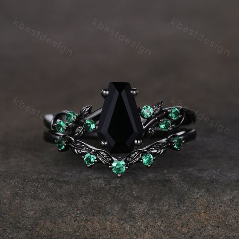 Gothic Black Gold Black Onyx Engagement Ring Art Deco Branch Design Leaf Emerald Wedding Ring Coffin cut Ring Unique Bridal Ring Set Unique coffin shaped ring, wedding ring, promise ring, anniversary gift. --Engagement Ring-- Main Stone: 9x6mm coffin shaped black onyx. Side stone: Emerald --Wedding Band-- Stone: Emerald *We offer stone selected service, you can choose the specific center stone for your order. Please feel free to contact us if needed. This ring is marked S925/G10K/G14K I accept c Emerald Green And Black Wedding Dress, Rings Black Stone, Black Onyx Ring Engagement, Black Emerald Wedding, Black And Green Engagement Ring, Dark Engagement Ring Black Diamond, Wedding Rings Black, Gothic Promise Rings, Black Gold Engagement Ring