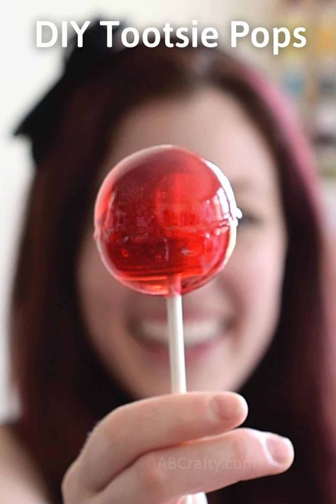 Holding large red homemade tootsie pop Tootsie Roll Pops, Homemade Lollipops, Large Lollipops, Giant Lollipops, Lollipop Recipe, Tootsie Pop, Fun Projects For Kids, Tootsie Roll, Semi Homemade