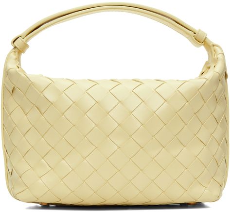 Intrecciato-woven grained calfskin shoulder bag in yellow. · Adjustable shoulder strap · Bumper studs at base · Zip closure · Grained lambskin lining · H6.5 x W10.5 x D4.5 in Supplier color: Camomile/Gold Bottega Bag, Yellow Purses, Yellow Satin, Satin Bags, Mini Shoulder Bag, Bottega Veneta, Calf Skin, Shoulder Strap, Women Wear