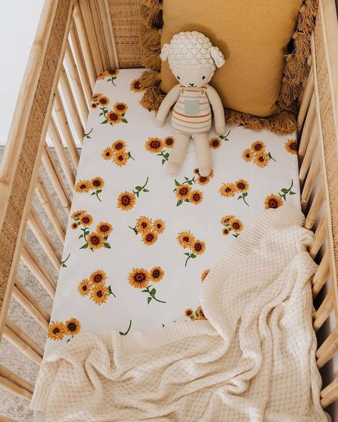 Newborn Essentials on Instagram: "🌻 S u n f l o w e r 🌻 We have welcomed our gorgeous Snuggle Hunny Kids Sunflowers into our bedding range including cot sheets and multi use fitted bassinet sheets / change pad cover. Styled beautifully with our cream baby blanket by @raising.them.kind Available online now!! Shop link..." {sunflower nursery sheets, baby girl sunflower nursery crib bedding, sunflower nursery ideas, sunflower nursery theme} Sunflower Nursery, Kids Sheets, Childrens Clothing Stores, Cot Mattress, Cot Bumper, Cot Sheets, Bassinet Sheets, Baby Cot, Newborn Essentials