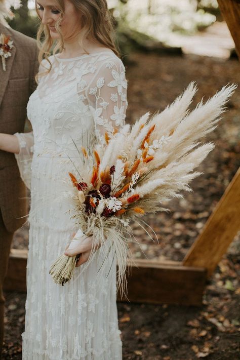 Would like to add burgundy and green. Love the shape, the copper orange, and the smaller pampas-like poofs Dried Flowers Wedding, Boho Wedding Bouquet, Boho Wedding Ideas, Grass Wedding, Wedding Abroad, Hand Bouquet, Whimsical Wonderland Weddings, Dried Flower Bouquet, Festival Wedding