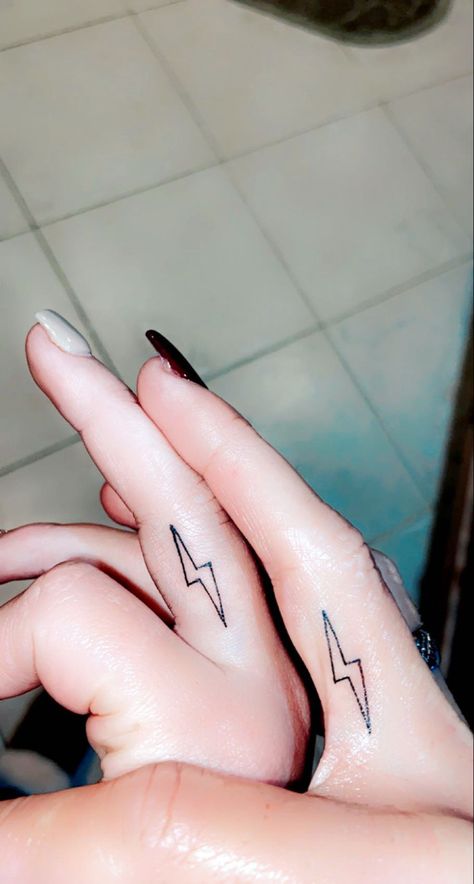 Finger Tattoos Lightning Bolt, Lighting Finger Tattoo, Finger Lightning Tattoo, Mini Deer Tattoo, Lightening Bolt Tattoo On Finger, Lighting Bolt Tattoo Meaning, Lightning Tattoo Finger, Lighting Bolt Finger Tattoo, Lightning Finger Tattoo