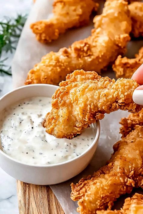 Buttermilk Fried Chicken Tenders - Insanely Good Bisquick Fried Chicken, Easy Chicken Tender Recipes, Buttermilk Fried Chicken Tenders, Easy Chicken Tenders, Buttermilk Chicken Tenders, Cornflake Chicken, Deep Fried Chicken, Chicken Receipes, Fried Chicken Tenders