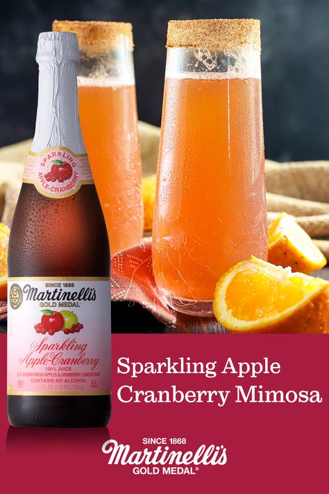 Festive mimosas call for cinnamon-sugared rims. The fruity tartness of Martinelli’s Sparkling Apple-Cranberry pairs perfectly with dry champagne for a refreshing seasonal spin on the classic bubbly brunch cocktail. #mimosa #mimosarecipe #applecranberry #applecider Martinelli Sparkling Cider Cocktail, Festive Mimosas, Martinellis Sparkling, Cranberry Mimosa Recipe, Grape Cocktails, Bubbly Brunch, Cranberry Mimosa, Cider Cocktail, Mimosa Recipe