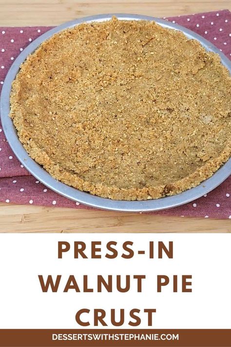 A walnut pie crust can add a delicious twist to your pies. One of the best things about this recipe is its' simplicity. Just mix together a few ingredients, stir together and press into a pie tin. No mixers or rolling pins required! #piecrust #walnutpiecrust #pressincrust via @https://www.pinterest.com/DessertsWithStephanie/ Cashew Pie Crust Recipe, Walnut Crust Pie, Nut Crust For Pie, Walnut Pie Crust Recipe, Nut Pie Crust Recipe, Nut Pie Crust, Walnut Pie Crust, Walnut Recipes Dessert, Walnut Pie Recipe