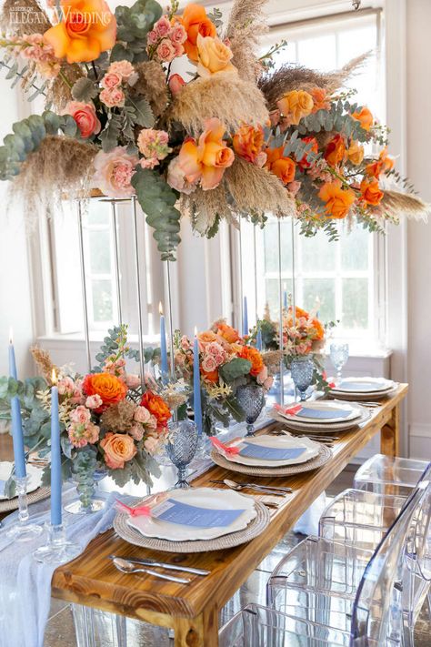 Orange and blue wedding inspiration | ElegantWedding.ca Summer Rustic Wedding Decor, Spanish Inspired Wedding Decoration, Blue Yellow And Orange Wedding, Blue Orange Wedding Decorations, Blue And Gold Reception Decor, Wedding Orange And Blue, Light Orange Wedding, Burnt Orange And Light Blue Wedding, Blue And Orange Summer Wedding