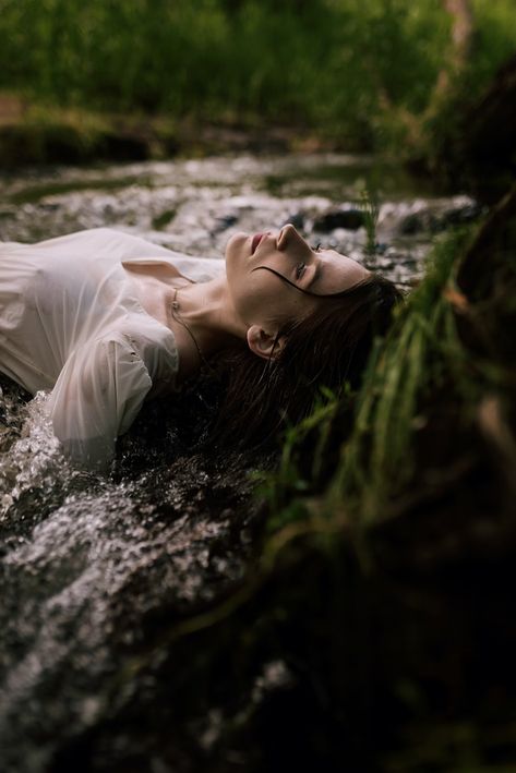 A person lying in a stream photo – Free Grey Image on Unsplash White Dress In Water, Woman In White Dress, Photo Of People, Saree Blue, Street Image, Grass Background, Water Photo, Woman Movie, Saree Photoshoot