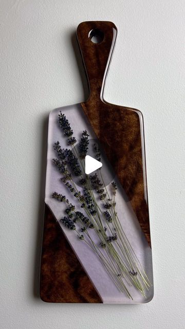 Jennifer Chapman on Instagram: "New work will be going on my store this Sunday 5pm Est. (8/27) 

This stunning lavender charcuterie board will be one of the pieces available Sunday. It has a hint of purple and sparkle in the resin, I wanted the lavender to be the main focus. 

@totalboat thickset and tabletop resin
@craftedelementsco silicone mold 

#charcuterie #charcuterieboard #lavender #walnut #resin #handmade #purple #statmentpieces #servingboards" Resin Charcuterie Board, Epoxy Projects, Abstract Art Paintings Acrylics, Diy Resin Projects, Resin Projects, Diy Resin Art, Diy Resin, Art Painting Acrylic, Resin Diy