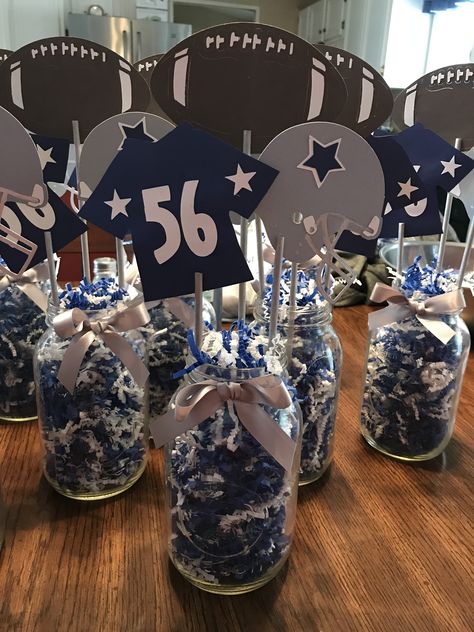 Turned out great for the centerpiece for the party. Diy Dallas Cowboys Party Decorations, Dallas Cowboys Table Decorations, Cowboys Birthday Party Decorations, Dallas Cowboy Backdrop Ideas, Dallas Cowboys 50th Birthday Party, Dallas Cowboy Centerpieces Ideas, Dallas Cowboys Party Ideas Centerpieces, Dallas Cowboy Party Ideas, Dallas Cowboys Birthday Party Decoration