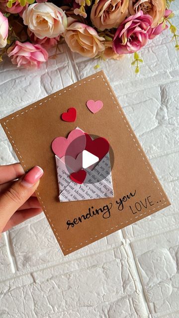 HANDMADE GIFTS AND SCRAPBOOK on Instagram: "Sending you LOVE❤️🫰🏻  Measurements: Brown sheet: 11*14cm Printed white sheet: 7*7cm Hearts: can be made in different sizes❣️  [Tip: take the base card sheet a little thick, preferably 300gsm]  Follow @handcrafted.shop for more such videos  Want more such videos?" Cute Cards To Make For Your Girlfriend, Craft Ideas Boyfriend, Cute Diy Cards For Girlfriend, I Love You Cards For Him Handmade, Homemade Card For Girlfriend, I Love You Card Ideas, Cute Cards For Boyfriend Diy Letters, Diy Gift Card For Boyfriend, Sending Love Card