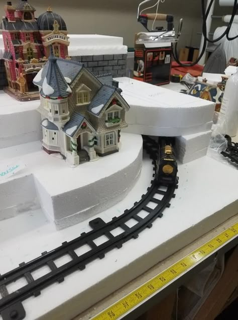 Christmas Village With Train Display, Christmas Train Village, Christmas Village Display With Train, Christmas Village With Train, Christmas Village Set Up Ideas, Diy Christmas Village Accessories, Shoe Cabinet Ideas, Diy Christmas Village Platform, Christmas Village Ideas