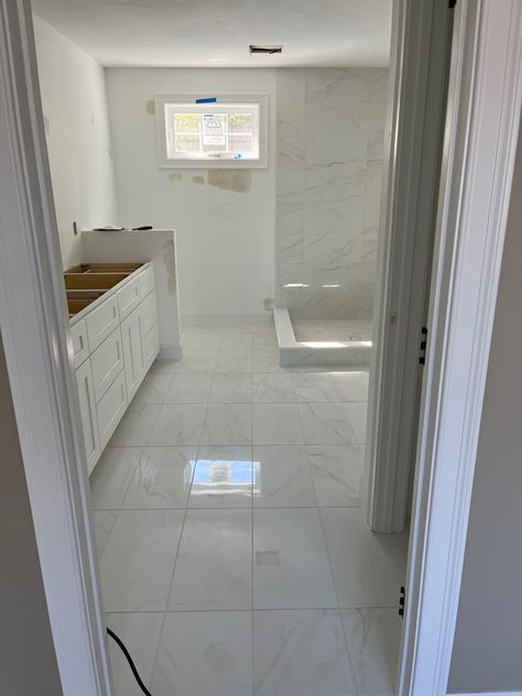 Classic 12 x 24 Polish finished porcelain tile stacked installation Stacked Floor Tile Bathroom, Stacked 12x24 Tile Floor, Marble Tile Bathroom Floor, Large Tile Bathroom, 12x24 Tile, White Porcelain Tile, Marble Tile Bathroom, Basement Reno, Patterned Floor Tiles