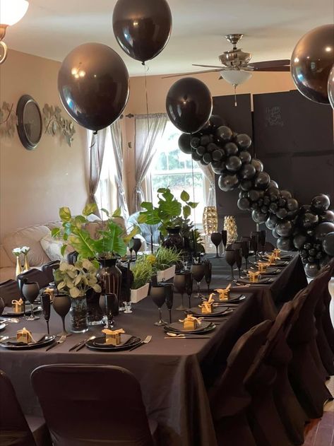 The theme was all black with gold and greenery. We have so much fun with balloons. Depending on the event balloons can make a room look amazing. Mans Bday Party Decorations, Men’s 45th Birthday Party Ideas, All Black Dinner Party Outfit, Black Dinner Party Outfit, Birthday Table Set Up For Men, All Black Dinner Party, Black Dinner Party, 21st Birthday Dinner, 30th Birthday Dinner