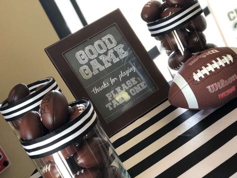 2018 Football themed Graduation Party | CatchMyParty.com Football Themes High School, Football Graduation Party Ideas, Themed Graduation Party, Football Centerpieces, End Of School Party Ideas, Diy Reception Decorations, Graduation Reception, End Of School Party, School Party Ideas