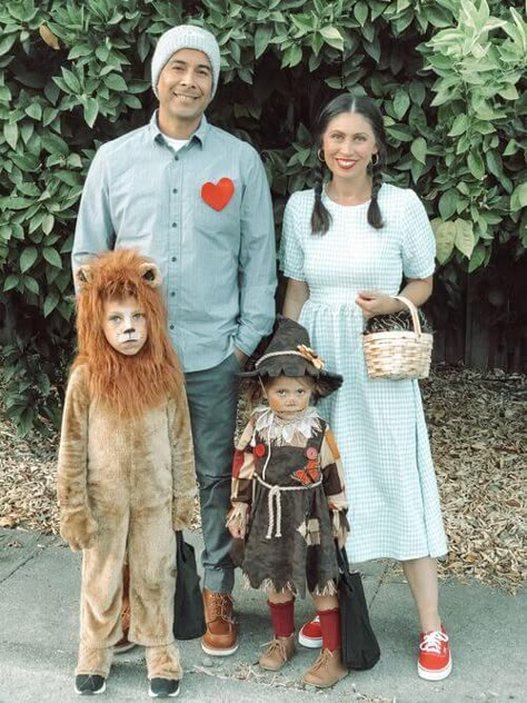 22 Funny Family Halloween Costume Ideas (Perfect For Parents & Kids) Wizard Of Oz Costume Wizard, Wizard Of Oz Family Costume Diy, Wizard If Oz Costumes Family, Family Halloween Costumes Wizard Of Oz, Lion Family Costume, Family Scarecrow Costumes, Wizard Of Oz Family Costume Ideas, Wizard Of Oz Diy Costumes, Wizard Of Oz Costume Ideas Family