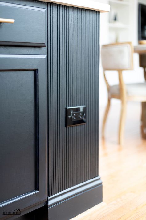 A modern black kitchen island with pole wrap Kitchen Island With Pole, Island With Pole, Modern Black Kitchen Island, Kitchen Island Molding, Beadboard Kitchen Island, Kitchen Island Panels, Kitchen Island Trim, Dated Kitchen, Kitchen Colour Combination