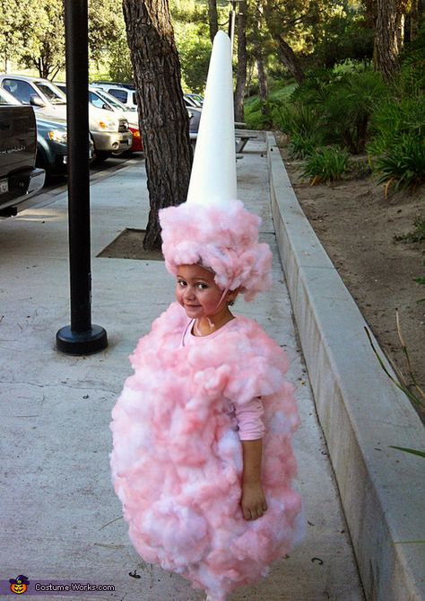 DIY Cotton Candy Costume.     Pink tshirt,  Pillow fill, Adhesive spray, Pink paint (for silk flowers),   Clown wig (with hair cut off and replaced with pillow fill),  light Poster board for cone,  Elastic to hold cone on head,   Pink polka dot knee highs, Blush and glitter for face + a cute kid! too cute!  @Sue Goldberg Ledezma, this is too funny@ Cotton Candy Costume, Geek Outfit, Candy Costume, Candy Costumes, Halloween Fest, Diy Costumes Kids, Diy Halloween Costumes For Kids, Homemade Halloween Costumes, Homemade Costumes