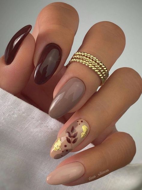 brown shades and leaf design Autumnal Nails 2022, Autumn Nail Designs 2022, 2022 Autumn Nails, Trendy Nails Autumn 2022, Autumn 2022 Nails, Gel Nails Autumn 2022, Trendy Almond Nails 2022 Fall, November Nails Fall Short Almond, Short Nail Designs Fall 2022