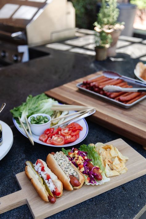 Best Hot Dog Toppings - The Ultimate Hot Dog Bar - Chris Loves Julia 4th Of July Hot Dog Bar, Hot Dog And Brat Bar, Hot Dog 4th Of July, Hot Dog Board, Hot Dog Tray, Hot Dog Diggity Dog Bar, Sandwich Specials, Cabbage Slaw Recipes, Making Hot Dogs