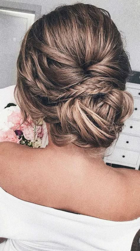 Here are surprisingly simple yet super-chic hairstyles for the girl/bride to be who just can’t be bothered. From The Twisted Bun,The Swept updo, The... Wedding Hair Fishtail Braid, Wedding Hair Fishtail, Hair Fishtail Braid, Updo Low Bun, Bun Wedding Hair, Updo Messy, Fishtail Braid Updo, Chignon Simple, Low Bun Wedding Hair