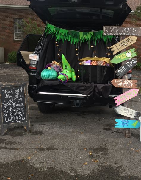 Our Peter Pan trunk-or-treat for Halloween! Neverland sign made from old pallet wood! Tinkerbell Trunk Or Treat Ideas, Never Land Trunk Or Treat, Peter Pan Truck Or Treat, Peter Pan Themed Trunk Or Treat, Neverland Trunk Or Treat, Trunk Or Treat Peterpan, Tinker Bell Trunk Or Treat, Tinkerbell Trunk Or Treat, Trunk Or Treat Peter Pan