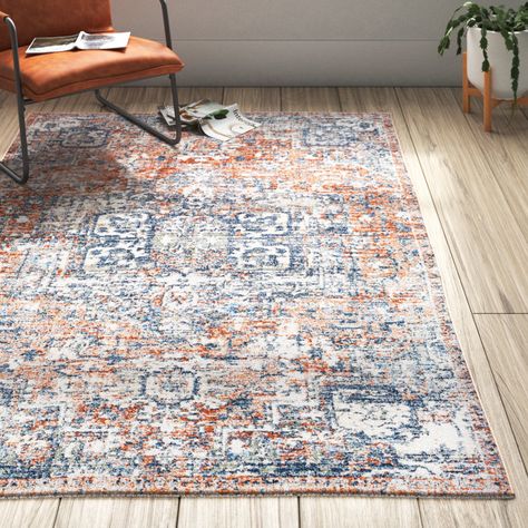 Orange Blue Rug, Navy And Orange Rug, Blue And Orange Apartment Decor, Navy Blue Mustard Yellow Burnt Orange Living Room, Blue Couch Living Room Rugs, Navy Orange Living Room, Blue Area Rugs In Living Room, Colorful Area Rugs In Living Room, Navy Blue And Orange Living Room