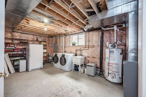 Lots of room to work with. Finish a laundry room with storage. Hide furnace in a utility closet. Add a powder bathroom. Basement Remodel Around Furnace, Unfinished Basement Laundry Area, Furnace Closet, Finished Basement Doors For A Furnace, Laundry Space In Unfinished Basement, Hide Furnace, Furnace In Middle Of Basement, Laundry Room With Storage, Room With Storage