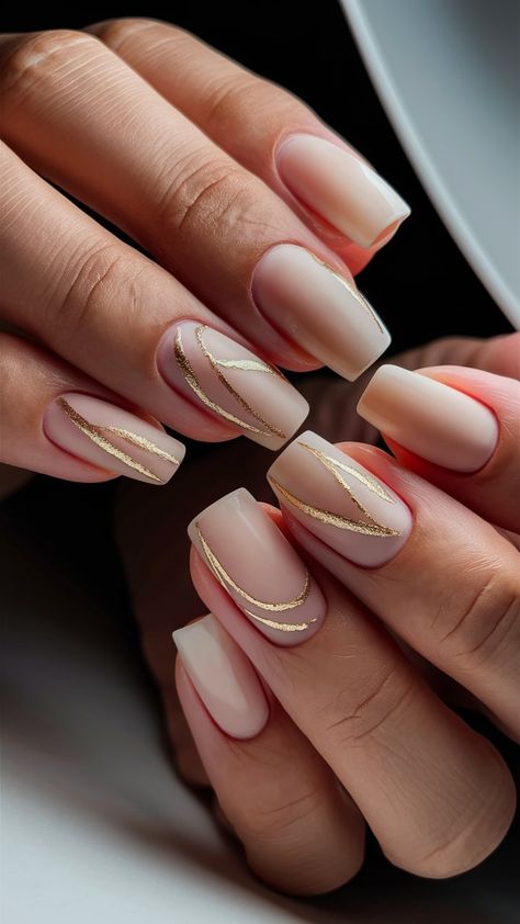 Wrap your nails in warmth with these gorgeous beige ombre creations! ☕🌟 The gradient from light beige to deeper tones exudes a cozy feel, while striking golden lines add a stylish touch. Perfect for fall or any sophisticated event, these nails are a true statement piece! 💖💅 #OmbreNails #NailDesign #GoldAccent Gradient Nude Nails, Nail Gradient Ideas, Gold And Beige Nails, Beige Gold Nails, Tan And Gold Nails, Beige Ombre Nails, Vacation Nail Colors, Ongles Beiges, Golden Nail Art