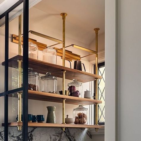 Palmer Industries on Instagram: "A standout feature of this stunning kitchen is the cleverly designed baking pantry, which artfully accommodates an awkwardly positioned load-bearing column. Designer Adams describes it as "that little baking quarter, which is kind of charming." It beautifully illustrates how functionality can meet beauty in design challenges. With Palmer’s bespoke solutions, the possibilities are endless! 

As seen in @archdigest 

Designed by: @bethany.adams.interiors 
Photo by @jljordanphotography 
Styling by @kimberlyswedelius 
Built by @designerbuildersky 

#palmer_industries #palmerindustries #remodeling #interior123 #homeinteriors #interiors #designer #homerenovation #interiordesign  #interiordesign #brass #designdetail  #designinspo #inspo  #brassshelf #brasshelving Palmer Industries, Baking Pantry, Brass Shelves, Stunning Kitchens, Design Challenges, In Design, Design Inspo, Home Renovation, Design Details