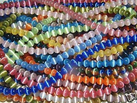 Beading Crafts, Cats Eye, Eye Beads, Bead Store, Diy Stuff, Evil Eye Charm, Bead Shop, Faceted Glass, Fiber Optic