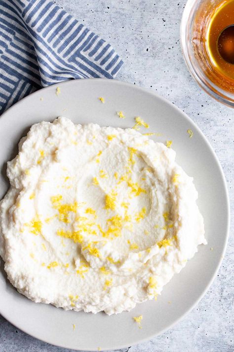 This creamy lemon ricotta is whipped to perfection, then topped with honey and fresh herbs. It's a delicious appetizer, especially when paired with crispy crostini or a fresh baguette. Whipped Lemon Ricotta, Crispy Crostini, Fresh Baguette, Lemon Ricotta, Yummy Appetizers, Fresh Herbs, Ricotta, Appetizer, Lemon