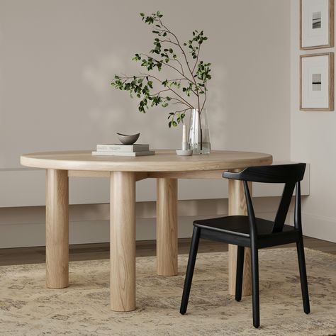 A simple form that's more than the sum of its parts, the Muhly Round Dining Table is boldly sculptural, but not overbearing. The round tabletop creates an intimate dining experience, while still ensuring ample room for knees and elbows. A hollow leg construction ensures the Muhly is easy to move around. With its minimalist white oak finish, the Muhly exudes a calming presence, making it the perfect addition to your next dinner party. Round Dining Table For 4, Oak Round Dining Table, 60 Round Dining Table, Kitchen Table Oak, Dining Table For 4, White Oak Dining Table, White Oak Table, Dining Table For 6, Modern Dining Furniture