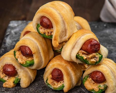 If jalapeño poppers and pigs in a blanket had a baby you would get these smoked jalapeño poppers pigs in a blanket! These cheese and bacon filled jalapenos, stuffed with a little smokie, wrapped in golden brown crescent dough, are hard to beat! Smoked Jalapeno, Jalapeño Poppers, Appetizer Sandwiches, Recipe App, Breakfast Appetizers, Bbq Seasoning, Crescent Dough, Homemade Bbq, Pigs In A Blanket