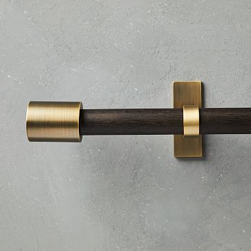 Inspired by '50s and '60s style, our Mid-Century Rod's smooth wood surface and finished metal hardware feel simple and sophisticated in any room. • Wooden rod in a Carbon finish. • Metal hardware in a Brass finish. • Adjustable length. … Modern Curtain Rods, Mid Century Curtains, Cordless Roller Shade, Steel Curtain, Layered Curtains, Metal Curtain, Curtain Hardware, Modern Curtains, Window Hardware