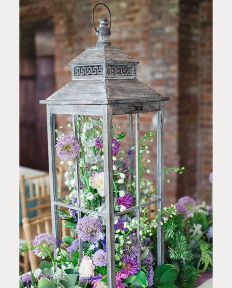 30 Gorgeous Ideas For Decorating With Lanterns At Weddings - Mon Cheri Bridals Flower Arrangements In Lanterns, Diy Decorative Lanterns, Decorating Ideas For Lanterns, Flowers In Lanterns, Decorating Lanterns Ideas For Spring, What To Put Inside Lanterns Decor, Plants In Lanterns, Decorating A Lantern Ideas, What To Put In A Lantern