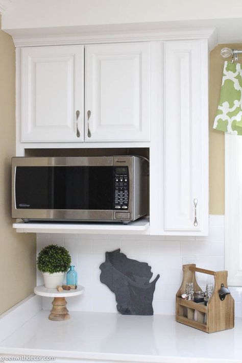 This is the best microwave height if your microwave is built into your upper cabinets! So smart to think about if you're renovating! Click through to see more! #greenwithdecor #kitchen #renovation Microwave Not Above Stove, Where To Put Microwave In Kitchen, Microwave Shelf Cabinet, Microwave Wall Shelf, Microwave And Otg Cabinet, Install Microwave Above Stove, Dyi Microwave Cabinet, Otr Microwave Without Cabinet, Built In Microwave Cabinet