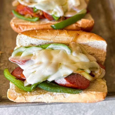 Cheesy Kielbasa Sandwiches Polish Sausage Sandwich, Kielbasa Sandwiches, Sandwich Dinners, Grilled Kielbasa, Cheesy Kielbasa, Sauerkraut Sandwich, Hot Sandwich Recipes, Sausage Sandwich, Crusty Rolls