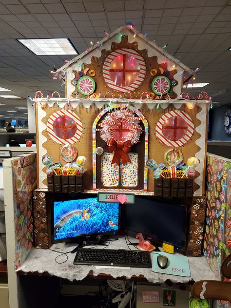 Christmas Cubicle/Desk Decoration. I made this DIY Gingerbread House with lots of cardboard, paper, paint, and Dollar Tree finds :)  #office #christmasdecor #holidaydesk #gingerbreaddesk #christmasdesk #christmas #xmas #winter #deskdecorations #diy #artsandcrafts #crafts #homemade #artist #art #candy #candyland #Christmascubicle #holidaycubicle #cubicle #desk #dollartree #michaels #gingerbread #gingerbreadman #gingerbreadhouse #gumdrops #lollipops #gummybears #wreath #chocolate #chocolates Gingerbread House Work Cubicle, Ginger Bread House Desk, Desk Gingerbread House, Candy Land Cubicle Ideas, Desk Decorating Christmas, Gingerbread House Desk Decorations, Gingerbread Desk Decorations, Gingerbread Office Cubicle, Gingerbread House Cubicle Decorations