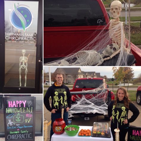 Drs. Eric & Megan with their chiropractic Trunk or Treat setup! Skeletons adjusting, "I got your back" t-shirts, and clementine jack-o-lanterns!   Herrmfamchiro.com 6110 NW 86th St. Ste 102 Johnston, Iowa 50131 515-276-4946  #halloween #trunkortreat #chiropractic Chiropractic Office Halloween Costumes, Skeleton Trunk Or Treat, Halloween Chiropractic, Skeleton Trunk Or Treat Ideas, Halloween Chiropractic Boards, Back To School Chiropractic Boards, September Chiropractic Boards, Laminate Hardwood Flooring, Trunk Or Treat Ideas