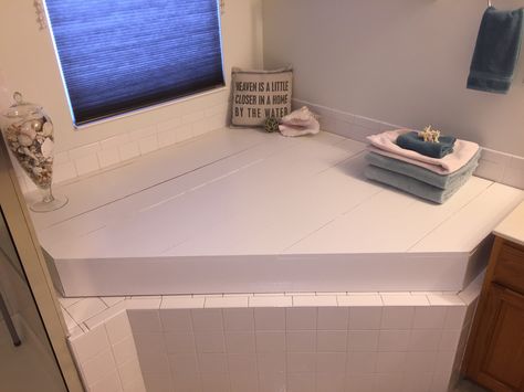 If you do not take baths and instead prefer to shower, have you ever wanted to do something with the space occupied by the spa or tub in your bathroom?  Our project last weekend was to design, cons… Bath Tub Cover Ideas, Spa Tub Bathroom, Garden Tub Makeover, Unused Bathtub Ideas, Garden Tub Ideas, Corner Garden Tub, Jet Bathtub, Bathtub Cover, Jetted Bath Tubs