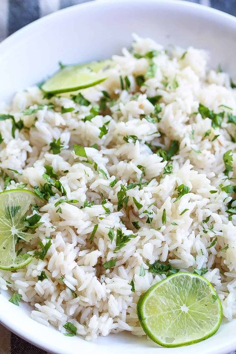 coconut ginger rice in a bowl and topped with limes and cilantro Coconut Ginger Rice, Ginger Rice Recipe, Ginger Rice, Rice Recipes Vegan, Coconut Ginger, Vegan Rice, Rice Recipes For Dinner, Rice Dinner, Lime Rice