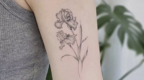 Meaningful Flower Tattoos For Women, Iris Flower Bouquet Tattoo, White Iris Tattoo, Iris Tattoo Arm, Wild Iris Tattoo, Iris Tattoo Forearm, Iris Wildflower Tattoo, Iris Violet Tattoo, Dainty Iris Tattoo