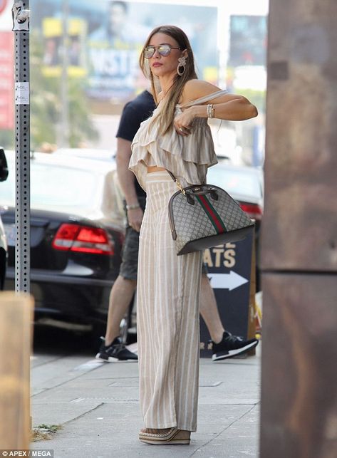 Keep crisp in striped linen like Sofia in Tularosa #DailyMail Click to buy it now Wedge Heels Outfit Dress, Wedge Heels Outfit, Gucci Espadrilles, Sofia Vergara Style, Heels Outfits, Sofia Vergara, Summer Chic, Celebrity Street Style, Striped Linen