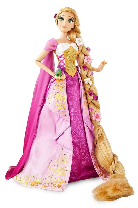 Rapunzel doll for the 10th Anniversary of Tangled. The adventurous, artistic and free-spirited princess is beautifully captured in this finely crafted doll featuring a full gown with gold embroidery, gems and ribbons, plus braided hair with paper flower accents. Tangled Doll, Tangled Cosplay, Disney Anniversary, Disney Barbie Dolls, Rapunzel Cosplay, Disney Shopping, Princess Birthday Cake, Disney Princess Dolls, Disney Figurines