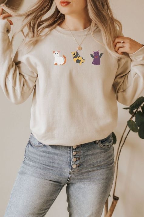 These super soft cat costume halloween sweatshirts are the perfect way to jump into spooky season. #halloweensweatshirt #giftforher #halloweencrewneck #catsweatshirt #ghostsweatshirt #catloversweater #fallsweatshirt #ghostvampirebatcostume #halloweencostume #catincostume Cloud Tshirt, Mama Pullover, Rainbow Sweatshirt, Mom Apparel, Cheer Tshirts, Cheer Mom Shirts, Vintage Christmas Sweaters, Mama Sweater, Mom Ideas