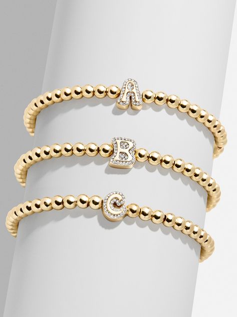 Shop doorbuster deals at BaubleBar, featuring up to 30% off stacking rings, Disney jewelry, custom necklaces & limited time deals. Enjoy free UPS shipping over $75 & free returns. Retro Bubble Font, Rings Disney, Bauble Bar Jewelry, Baublebar Bracelet, Bubble Font, Gold Medallion Necklace, Disney Necklace, Asymmetrical Necklace, Custom Necklaces