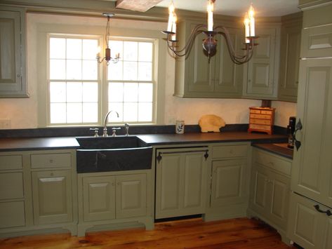 My wife and I have been restoring a 1776 colonial for the last 4 years. It had once been abandoned before suffering a 1970s renovation. We have successfully transformed a couple other rooms and... Colonial Kitchen Ideas, Colonial Style Kitchen, Primitive Kitchen Cabinets, Honed Granite Countertops, Colonial Kitchens, Primitive Kitchens, Wooden Kitchen Cabinets, Honed Granite, Primitive Living