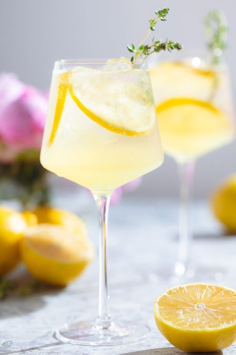 This Limoncello Spritz is a fun lemon twist on the popular Aperol Spritz we all know and love and it's incredibly easy to make. It's sweet, tart, and so refreshing. It also has added lemon juice to up the zesty lemon flavor even more! This cocktail is great on its own or with appetizers. Passion Fruit Margarita, Cucumber Lemonade, Limoncello Spritz, Aperol Spritz Recipe, Digestive Bitters, Light Cocktails, Sparkling Mineral Water, Perfect Summer Drink, Prosecco Cocktails